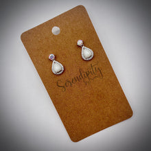 Load image into Gallery viewer, Breast Milk Keepsake Earrings with 6x8mm Breast Milk “Stones” in a Cubic Zirconia Halo and 4mm birthstone stud