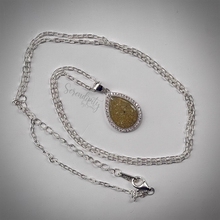 Load image into Gallery viewer, Sterling Silver Flat Tear Drop Cremation Ash Pendant with a Cubic Zirconia Halo