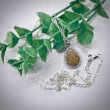 Load image into Gallery viewer, Sterling Silver Flat Tear Drop Cremation Ash Pendant with a Cubic Zirconia Halo