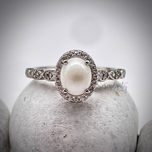 Load image into Gallery viewer, 6x8mm Oval Breast Milk Keepsake Ring with Halo and Marquise Band of Cubic Zirconia