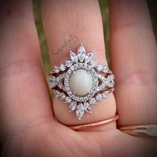Load image into Gallery viewer, 7x9mm Breast Milk Keepsake Ring with Large Breast Milk “Stone” in a Halo and Infinity Band of Cubic Zirconia with Stacking Bands
