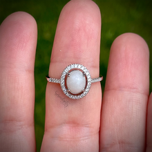 Load image into Gallery viewer, Breast Milk Keepsake Ring with 6x8mm Breast Milk “Stone” in a Halo of Cubic Zirconia