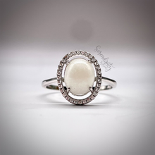 Load image into Gallery viewer, Breast Milk Keepsake Ring with 6x8mm Breast Milk “Stone” in a Halo of Cubic Zirconia