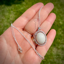 Load image into Gallery viewer, Sterling Silver Oval Breast Milk Pendant with a Cubic Zirconia Halo