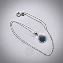 Load image into Gallery viewer, Sterling Silver Flat Tear Drop Cremation Ash Pendant with a Cubic Zirconia Halo