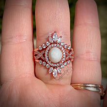 Load image into Gallery viewer, 7x9mm Breast Milk Keepsake Ring with Large Breast Milk “Stone” in a Halo and Infinity Band of Cubic Zirconia with Stacking Bands