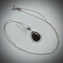 Load image into Gallery viewer, Sterling Silver Flat Tear Drop Cremation Ash Pendant with a Cubic Zirconia Halo