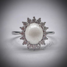 Load image into Gallery viewer, Breast Milk Keepsake Ring with Large Breast Milk “Stone” in a Pointed Halo of Cubic Zirconia