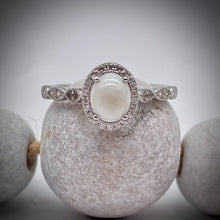 Load image into Gallery viewer, 6x8mm Oval Breast Milk Keepsake Ring with Halo and Marquise Band of Cubic Zirconia