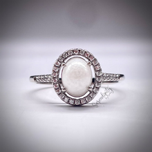 Load image into Gallery viewer, Breast Milk Keepsake Ring with 6x8mm Breast Milk “Stone” in a Halo of Cubic Zirconia