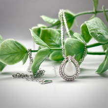 Load image into Gallery viewer, 6x8mm Sterling Silver Tear Drop Breast Milk Pendant with a Cubic Zirconia Halo