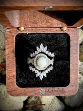 Load image into Gallery viewer, 7x9mm Breast Milk Keepsake Ring with Large Breast Milk “Stone” in a Halo and Infinity Band of Cubic Zirconia with Stacking Bands