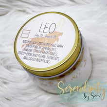 Load image into Gallery viewer, 6oz natural soy wax candle with a double wood wick. I created a special blend of essential oils that are associated with each particular zodiac sign. Each are also infused with floral elements, herbs, and genuine crystal gemstones, each candle containing those specific to their sign.