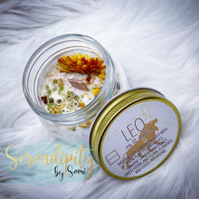 Load image into Gallery viewer, 6oz natural soy wax candle with a double wood wick. I created a special blend of essential oils that are associated with each particular zodiac sign. Each are also infused with floral elements, herbs, and genuine crystal gemstones, each candle containing those specific to their sign.