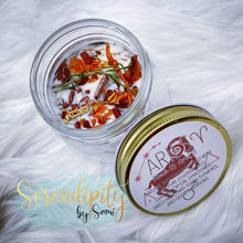 Load image into Gallery viewer, 6oz natural soy wax candle with a double wood wick. I created a special blend of essential oils that are associated with each particular zodiac sign. Each are also infused with floral elements, herbs, and genuine crystal gemstones, each candle containing those specific to their sign.