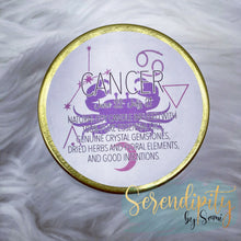 Load image into Gallery viewer, 6oz natural soy wax candle with a double wood wick. I created a special blend of essential oils that are associated with each particular zodiac sign. Each are also infused with floral elements, herbs, and genuine crystal gemstones, each candle containing those specific to their sign.