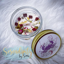 Load image into Gallery viewer, 6oz natural soy wax candle with a double wood wick. I created a special blend of essential oils that are associated with each particular zodiac sign. Each are also infused with floral elements, herbs, and genuine crystal gemstones, each candle containing those specific to their sign.