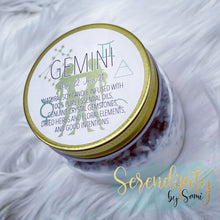 Load image into Gallery viewer, 6oz natural soy wax candle with a double wood wick. I created a special blend of essential oils that are associated with each particular zodiac sign. Each are also infused with floral elements, herbs, and genuine crystal gemstones, each candle containing those specific to their sign.