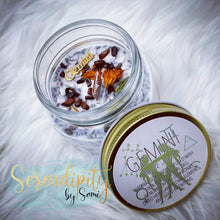 Load image into Gallery viewer, 6oz natural soy wax candle with a double wood wick. I created a special blend of essential oils that are associated with each particular zodiac sign. Each are also infused with floral elements, herbs, and genuine crystal gemstones, each candle containing those specific to their sign.