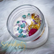 Load image into Gallery viewer, 6oz natural soy wax candle with a double wood wick. I created a special blend of essential oils that are associated with each particular zodiac sign. Each are also infused with floral elements, herbs, and genuine crystal gemstones, each candle containing those specific to their sign.