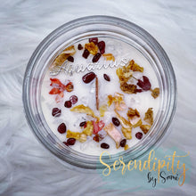 Load image into Gallery viewer, 6oz natural soy wax candle with a double wood wick. I created a special blend of essential oils that are associated with each particular zodiac sign. Each are also infused with floral elements, herbs, and genuine crystal gemstones, each candle containing those specific to their sign.