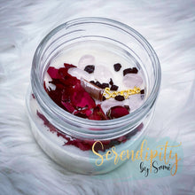 Load image into Gallery viewer, 6oz natural soy wax candle with a double wood wick. I created a special blend of essential oils that are associated with each particular zodiac sign. Each are also infused with floral elements, herbs, and genuine crystal gemstones, each candle containing those specific to their sign.