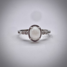 Load image into Gallery viewer, 6x8mm Oval Breast Milk Keepsake Ring with Cubic Zirconia
