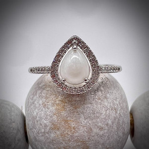 Breast Milk Keepsake Ring with 6x8mm Teardrop Breast Milk “Stone” in a Halo of Cubic Zirconia