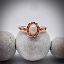 Load image into Gallery viewer, 6x8mm Oval Breast Milk Keepsake Ring with Marquise Halo and Band of Cubic Zirconia
