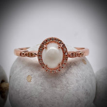 Load image into Gallery viewer, 6x8mm Oval Breast Milk Keepsake Ring with Halo and Marquise Band of Cubic Zirconia
