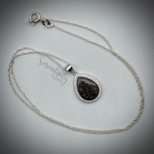 Load image into Gallery viewer, Sterling Silver Flat Tear Drop Cremation Ash Pendant with a Cubic Zirconia Halo
