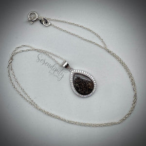 Sterling Silver Flat Tear Drop Cremation Ash Pendant with a Cubic Zirconia Halo